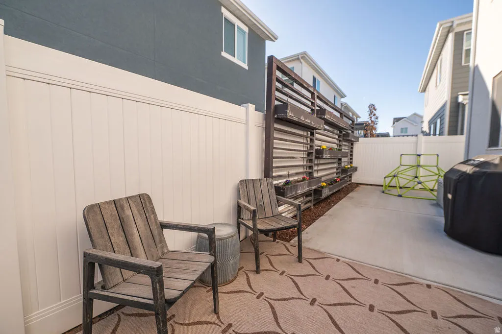 View of patio with area for grilling