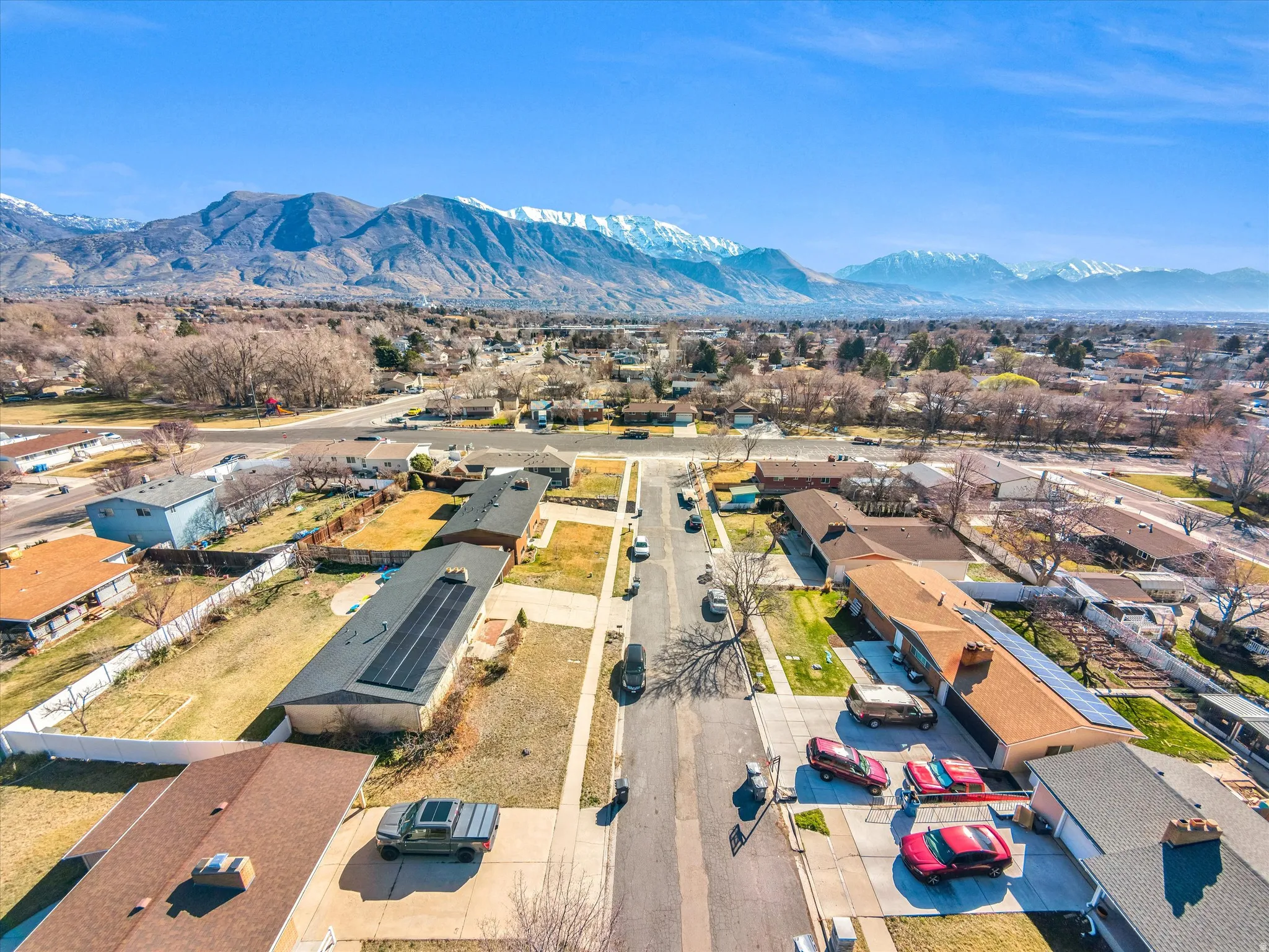 Aerial view of residential area with a mountain backdrop