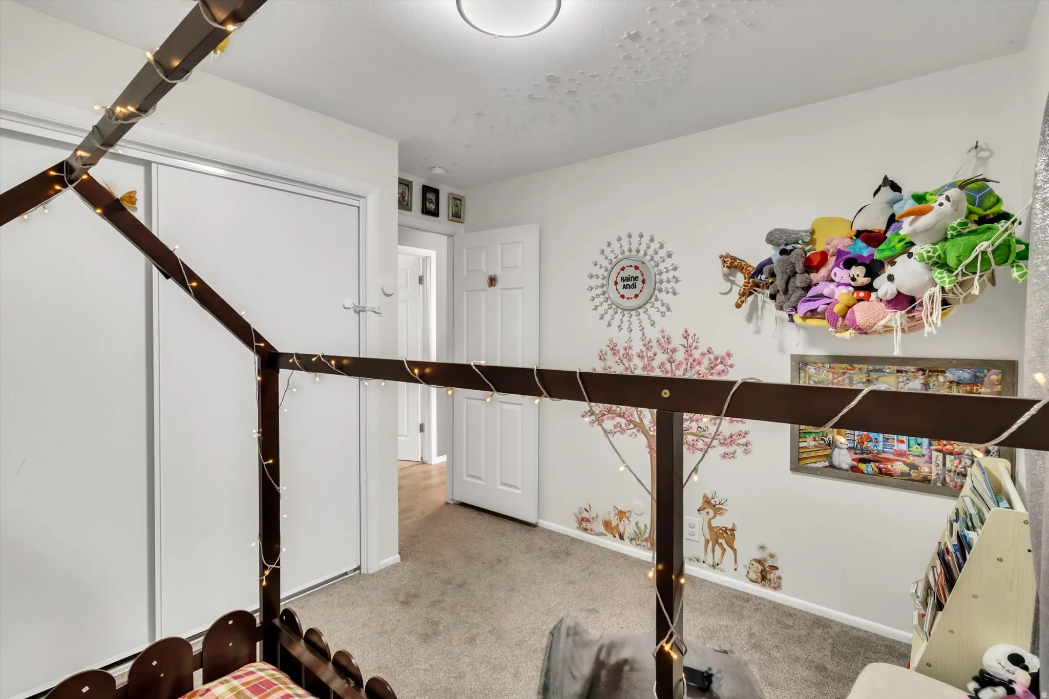 Workout area featuring carpet and baseboards