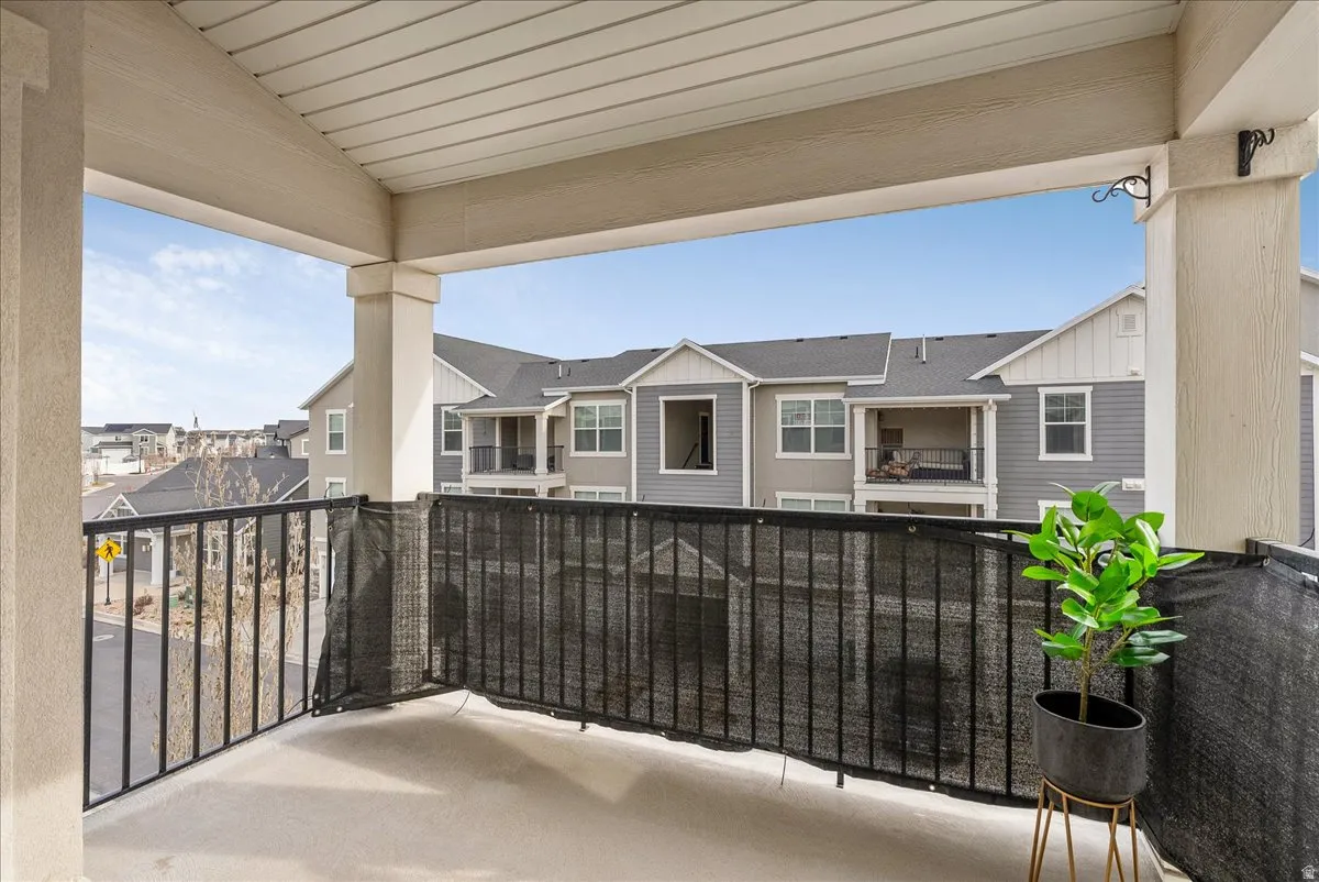 Balcony featuring a residential view