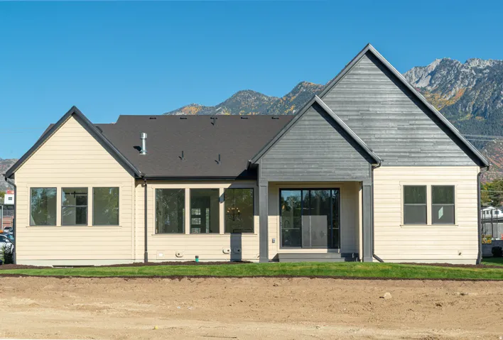 Rear view of house with a mountain view