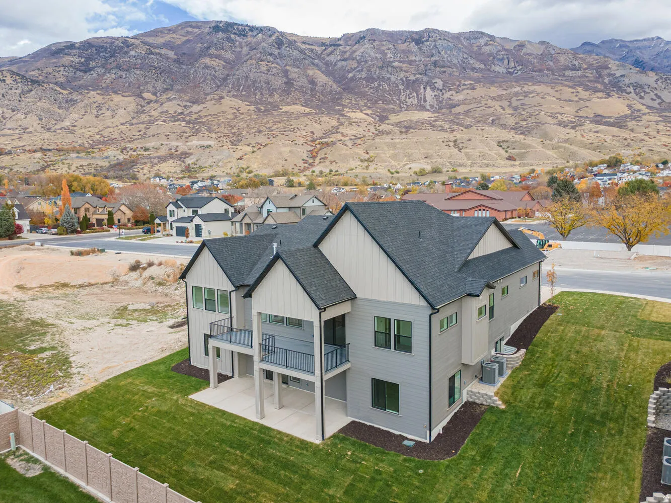 Aerial perspective of suburban area with mountains