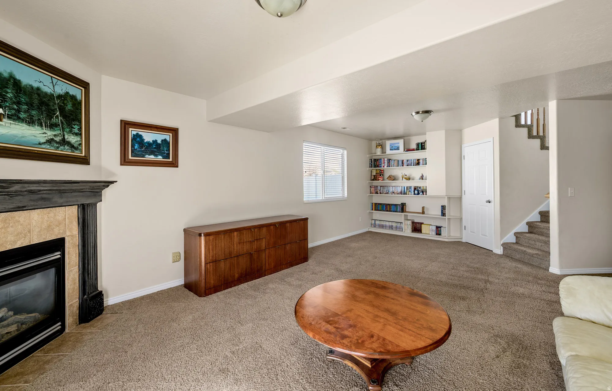 Family Room with built-in book shelves