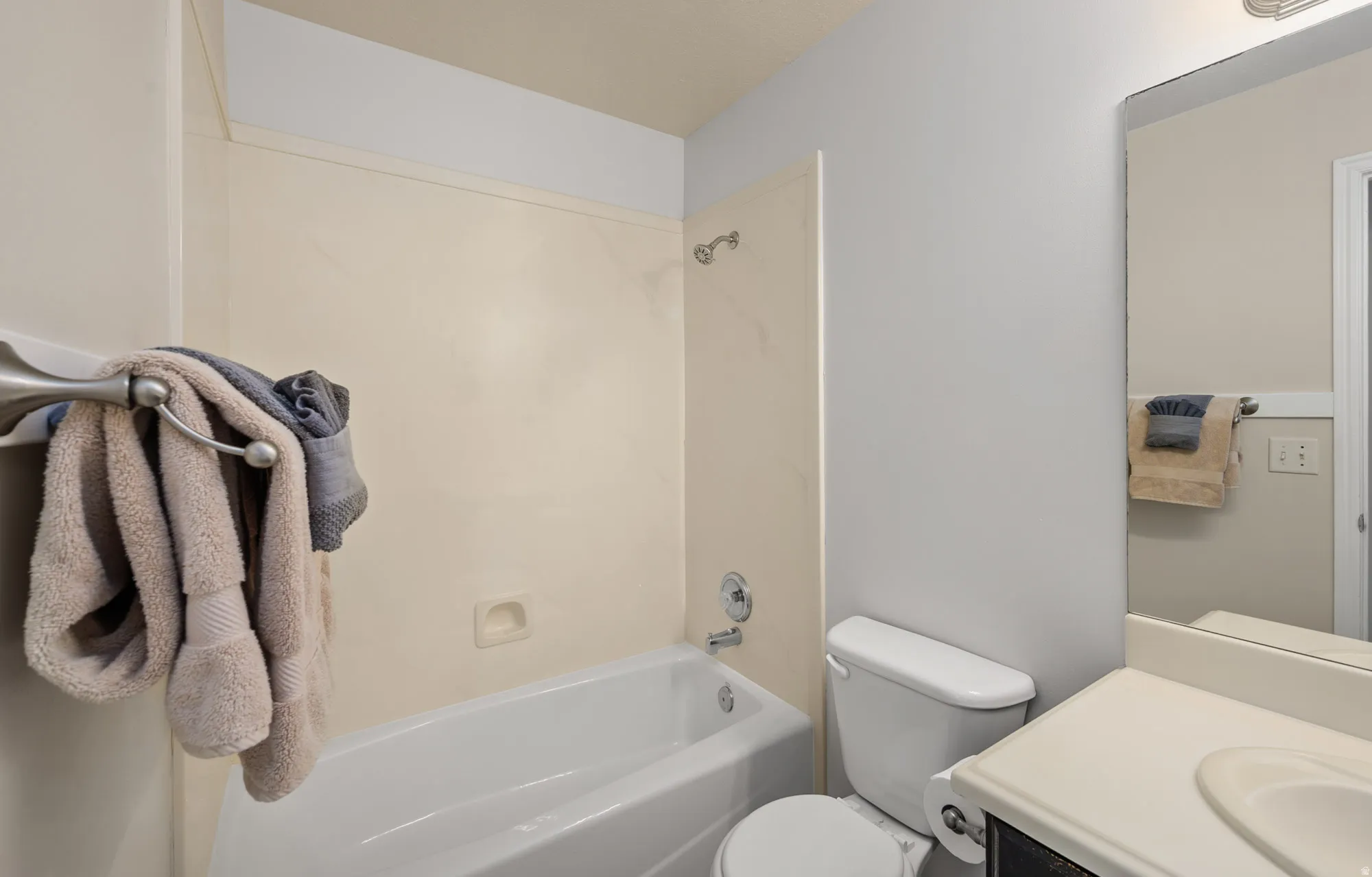 Full Bath with vanity and shower / tub combination