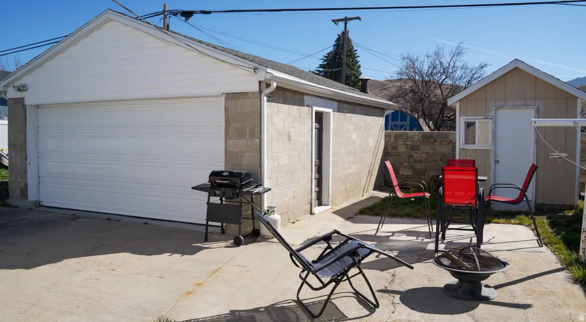 Detached garage with a shed