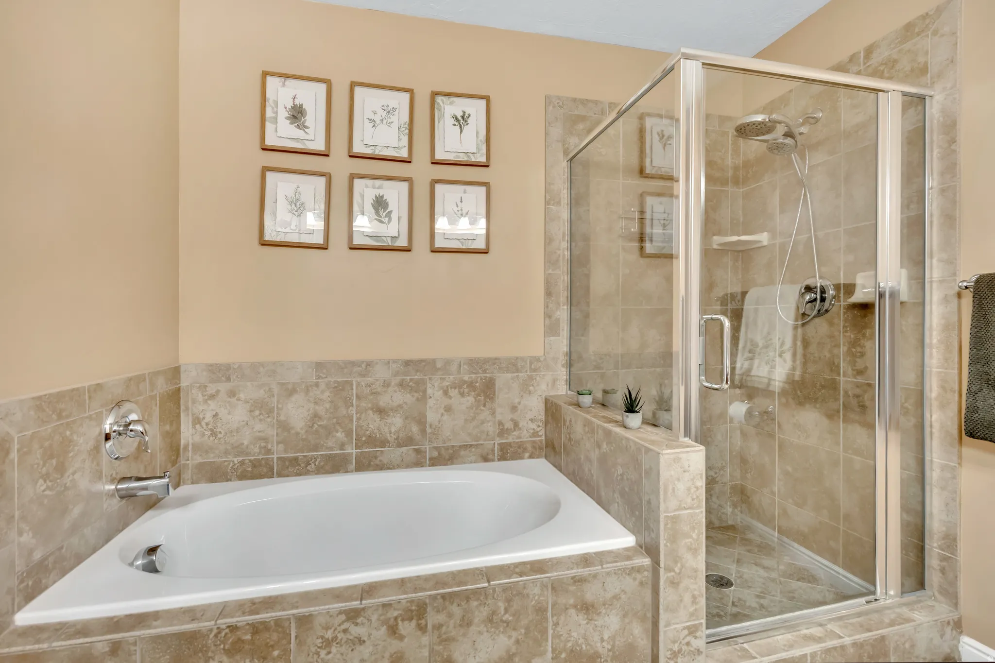 Owner's suite bathroom featuring separate tub/shower.