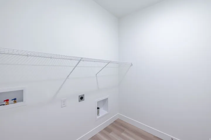 White wire shelving and wood-finish flooring