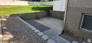 Fenced yard featuring a patio area
