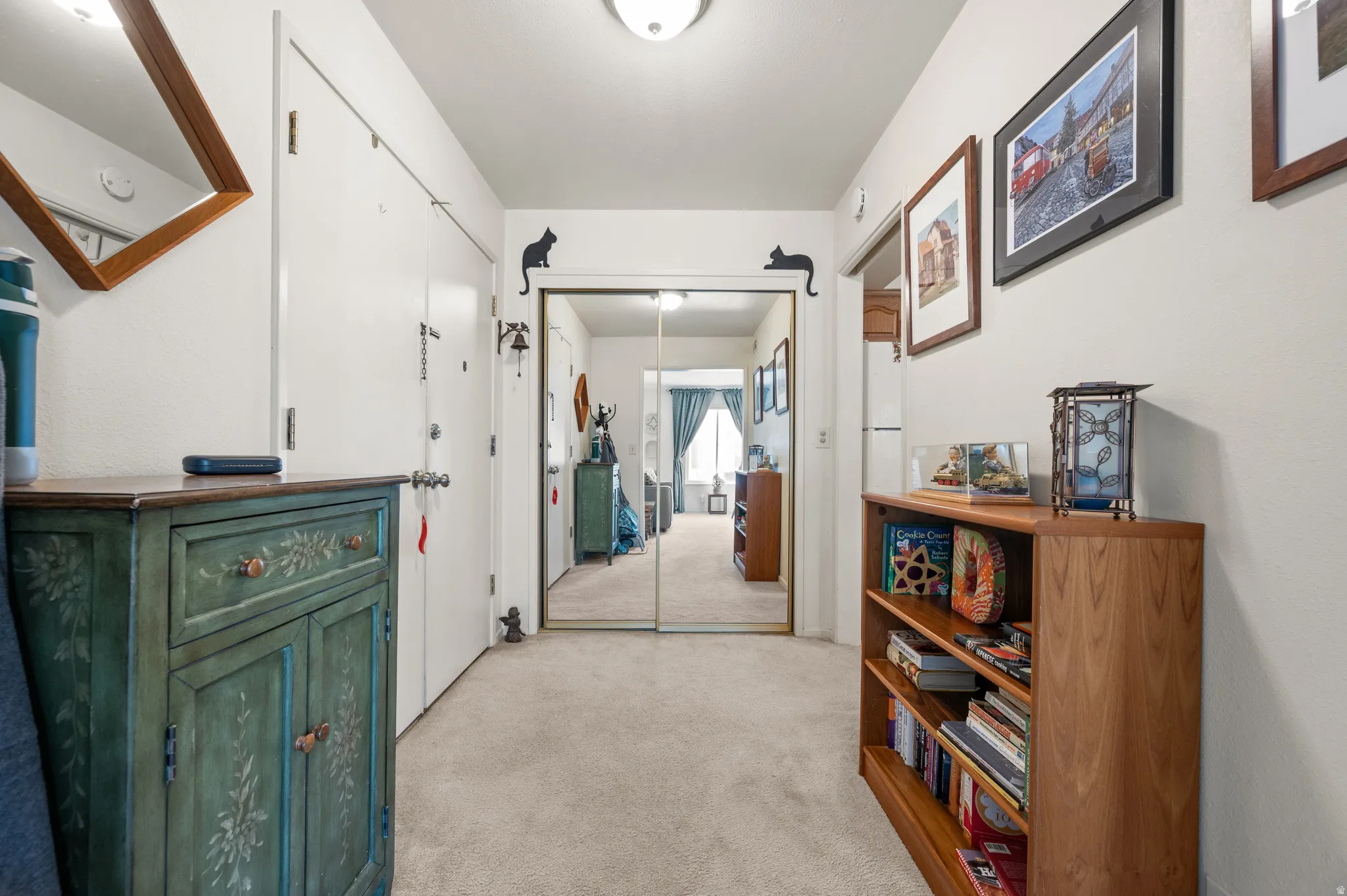 Hallway with light colored carpet