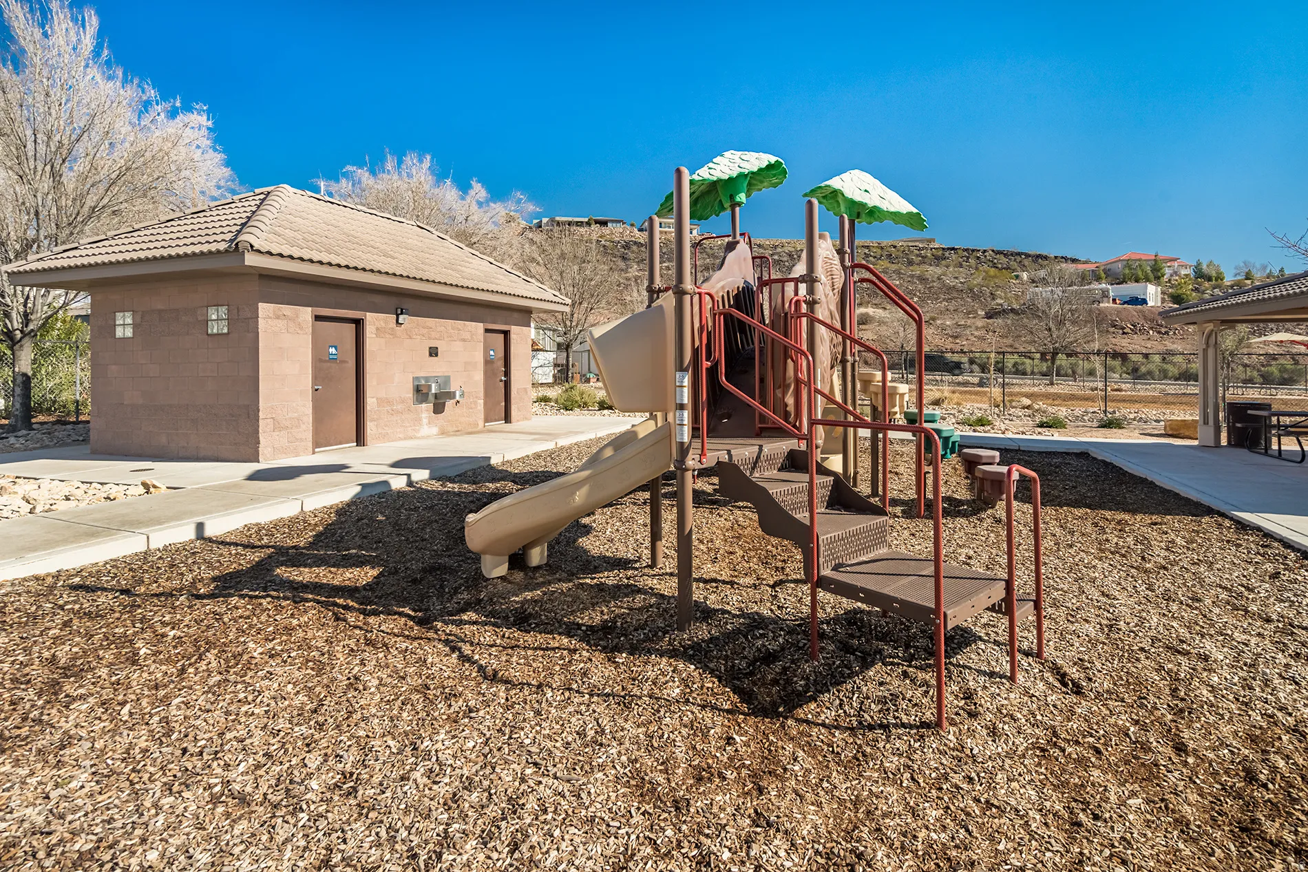 Community play area featuring a patio and a gazebo
