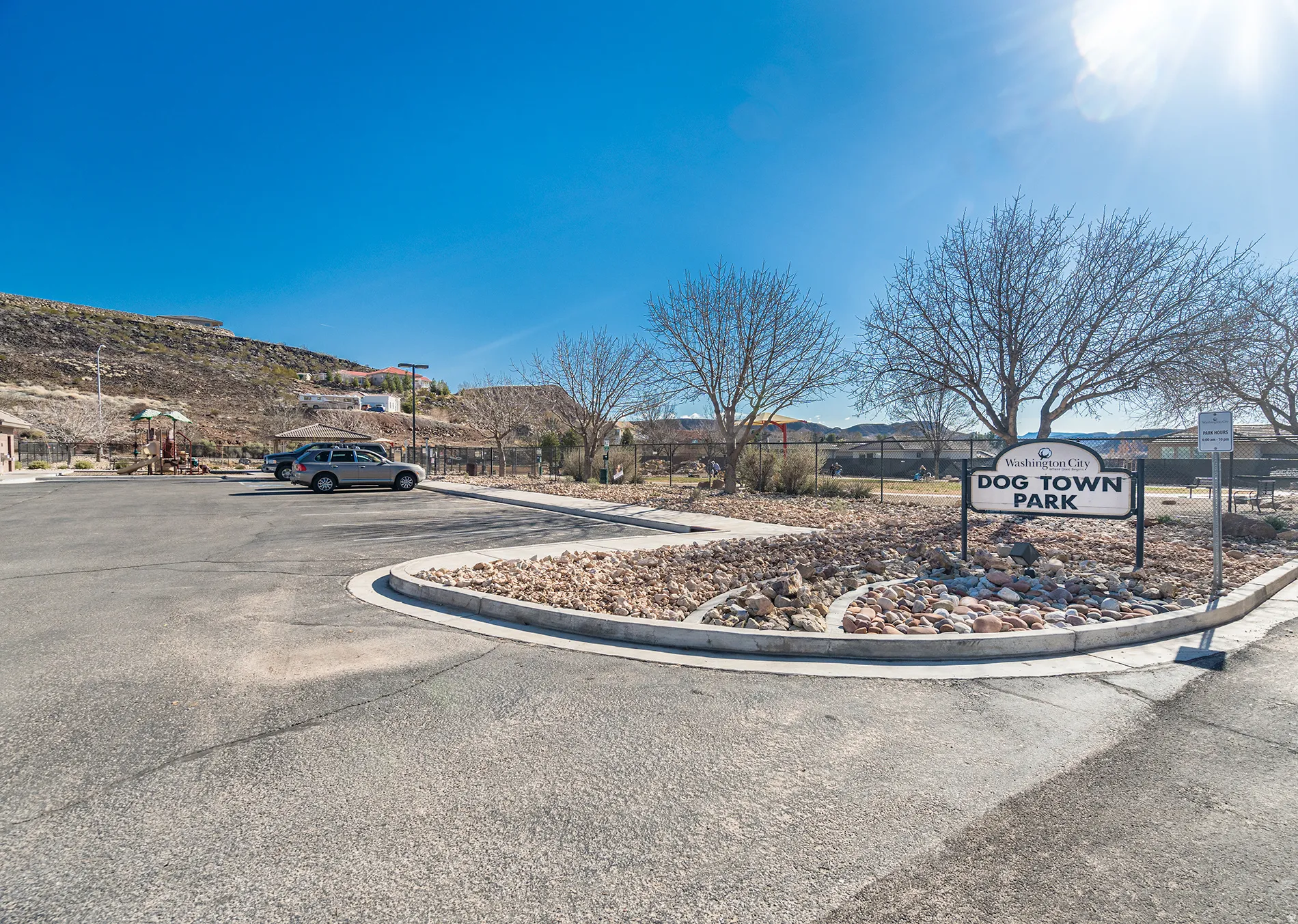 View of asphalt street with curbs and a residential view