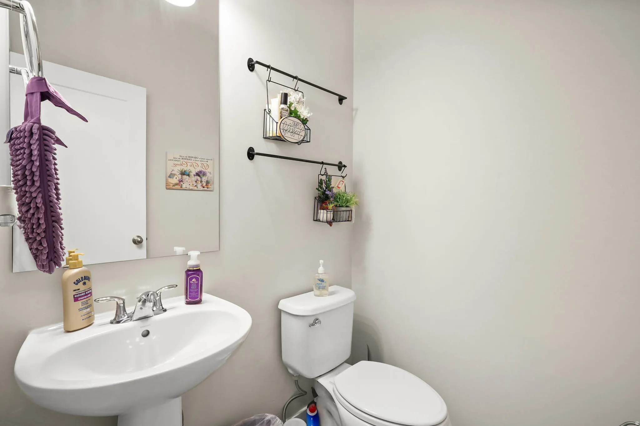 Bathroom featuring toilet and a sink