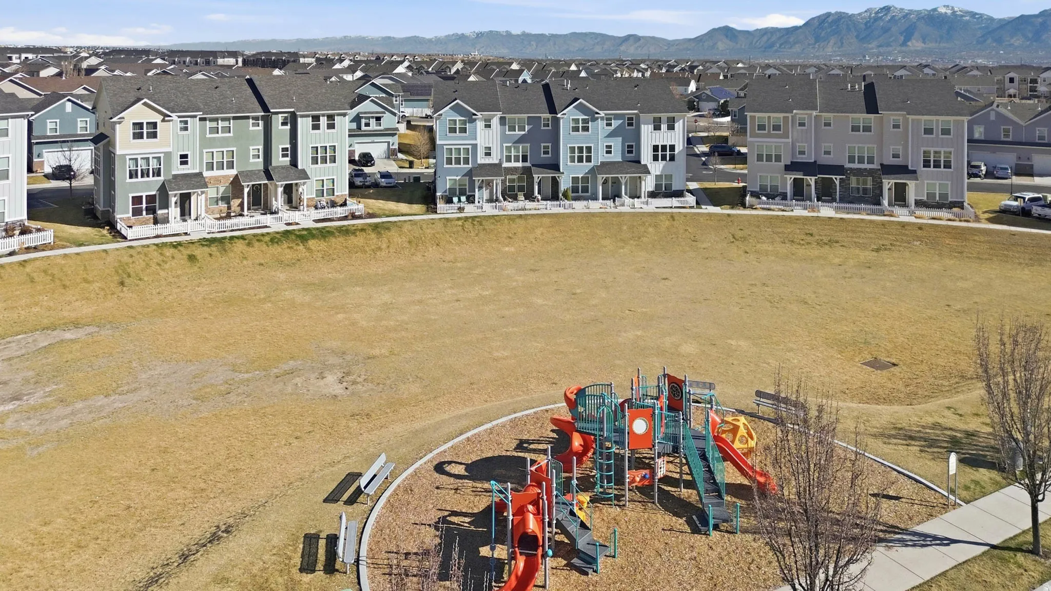 Aerial view of residential area featuring a recreational park