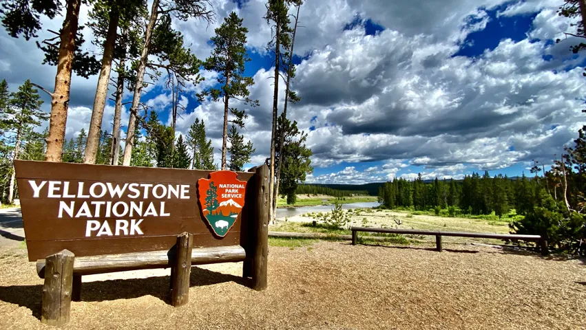 Community sign featuring a water view