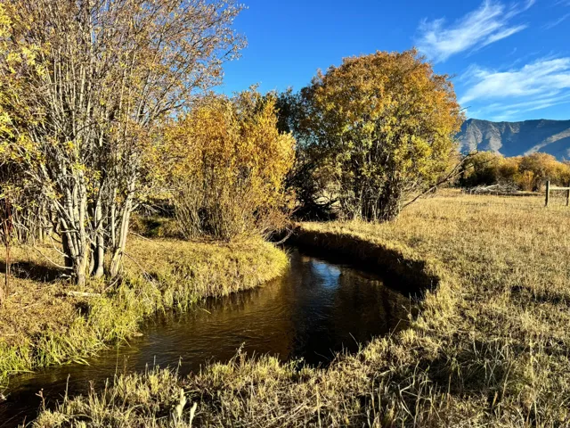 Water view with a mountainous background