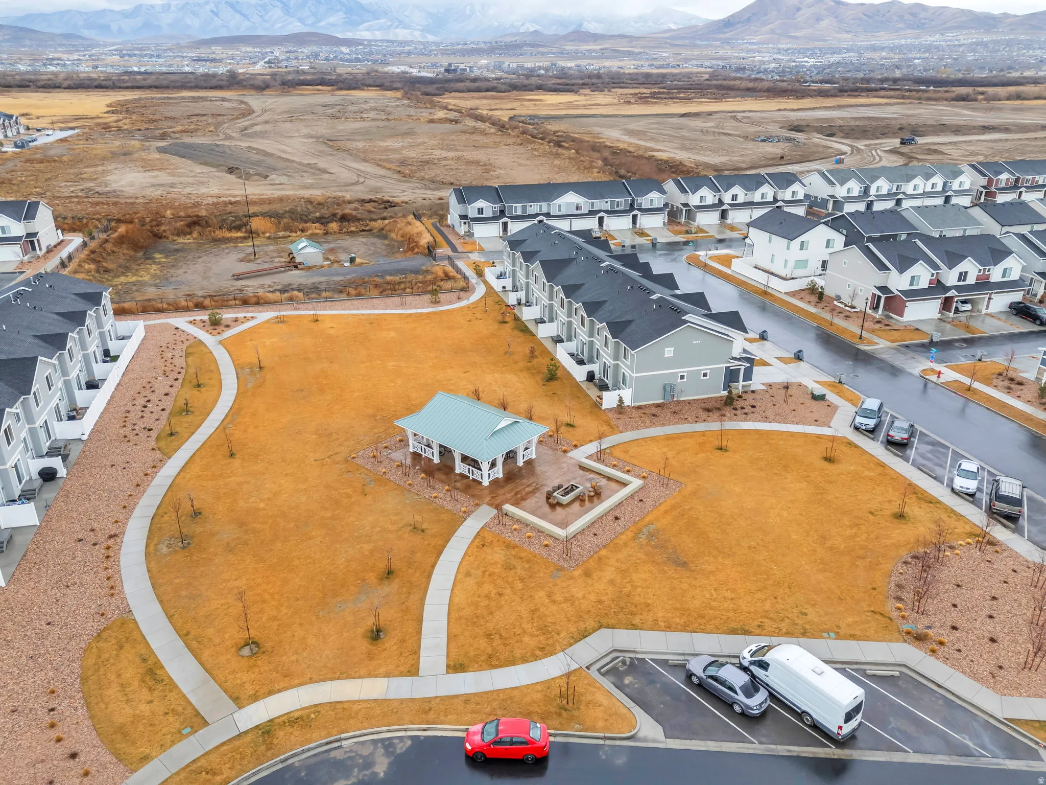 Aerial view of residential area with a mountainous background