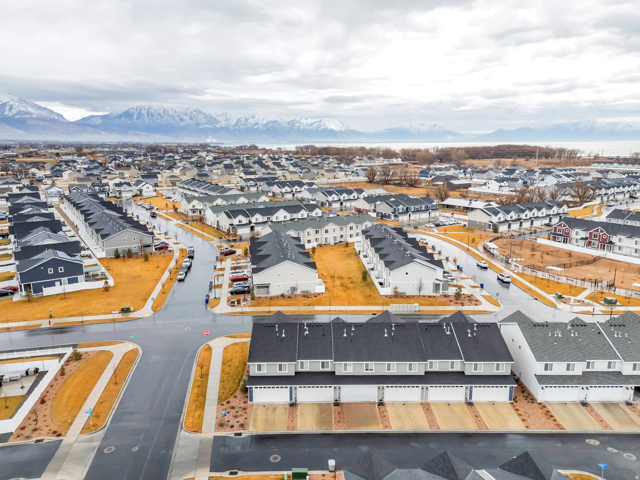 Aerial view of residential area with a mountain backdrop
