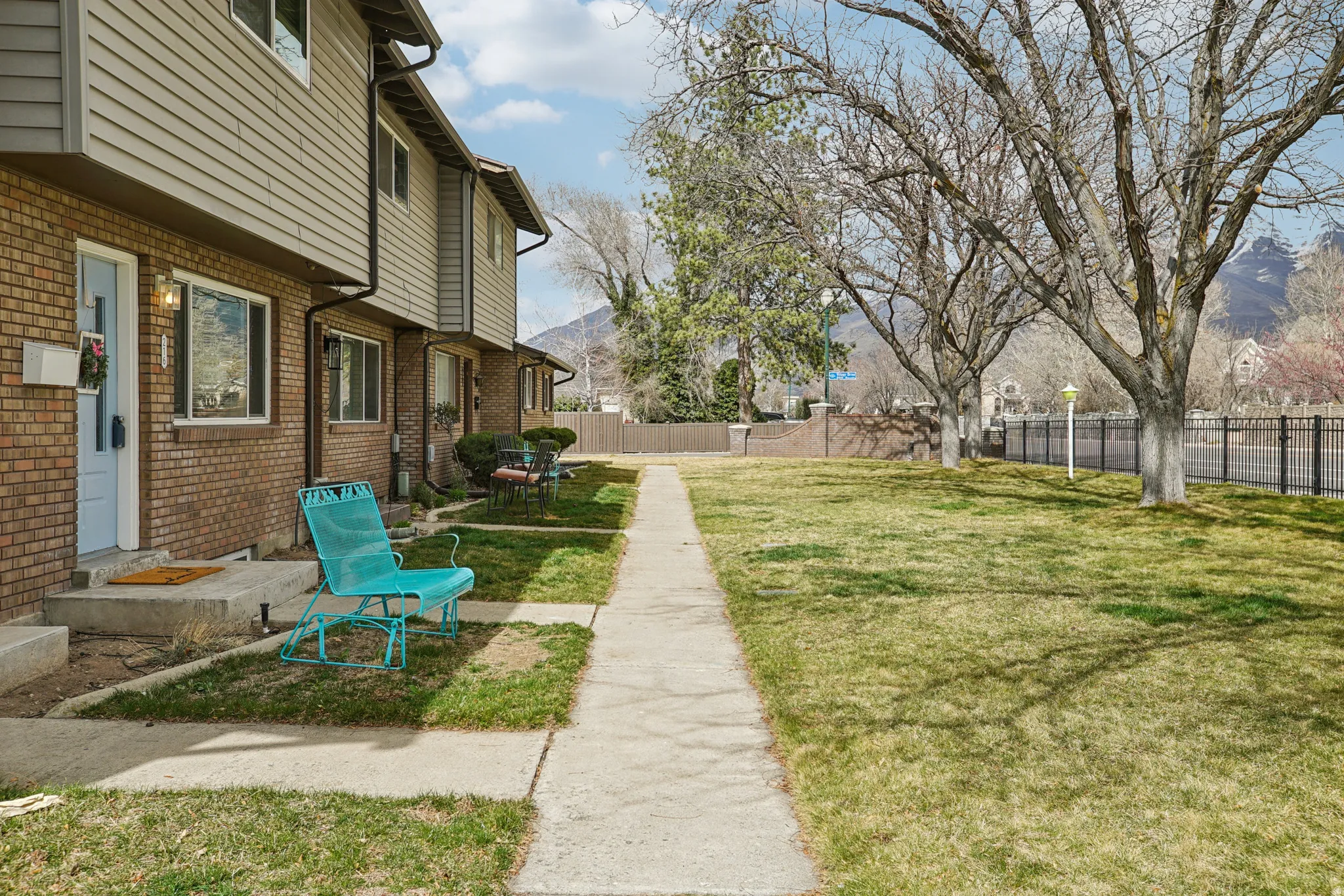 Fenced backyard with a mountain view