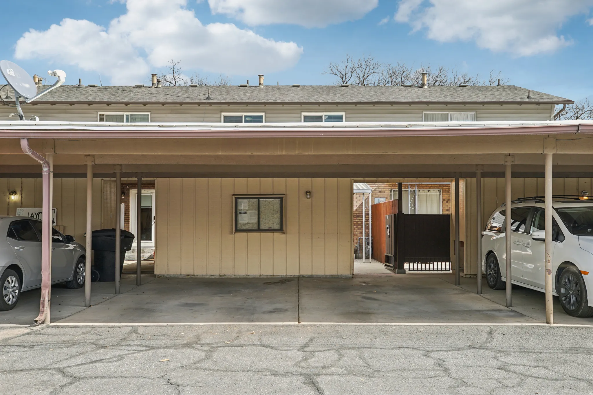 Garage featuring covered parking