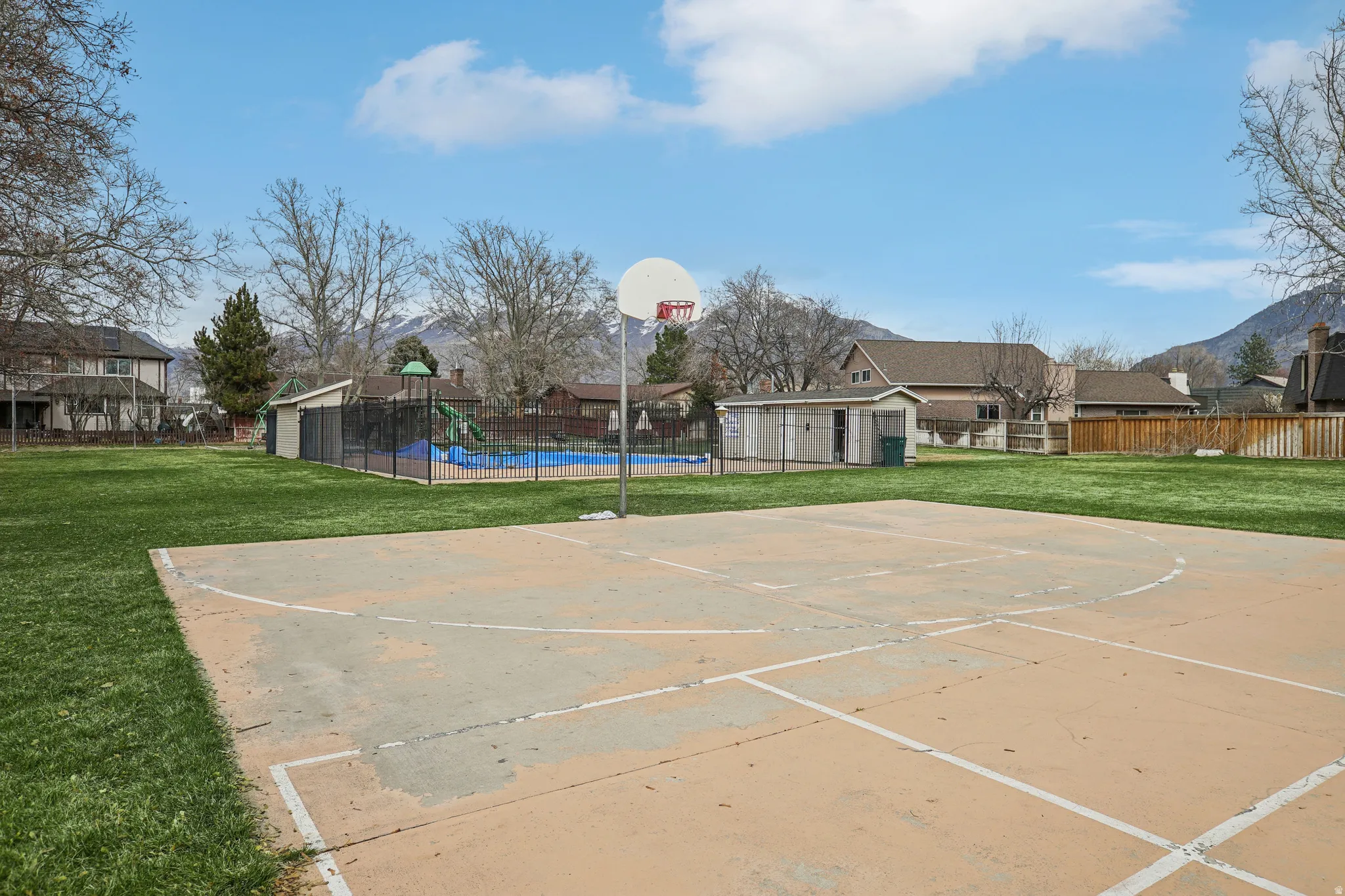 View of sport court featuring community basketball court and a mountain view