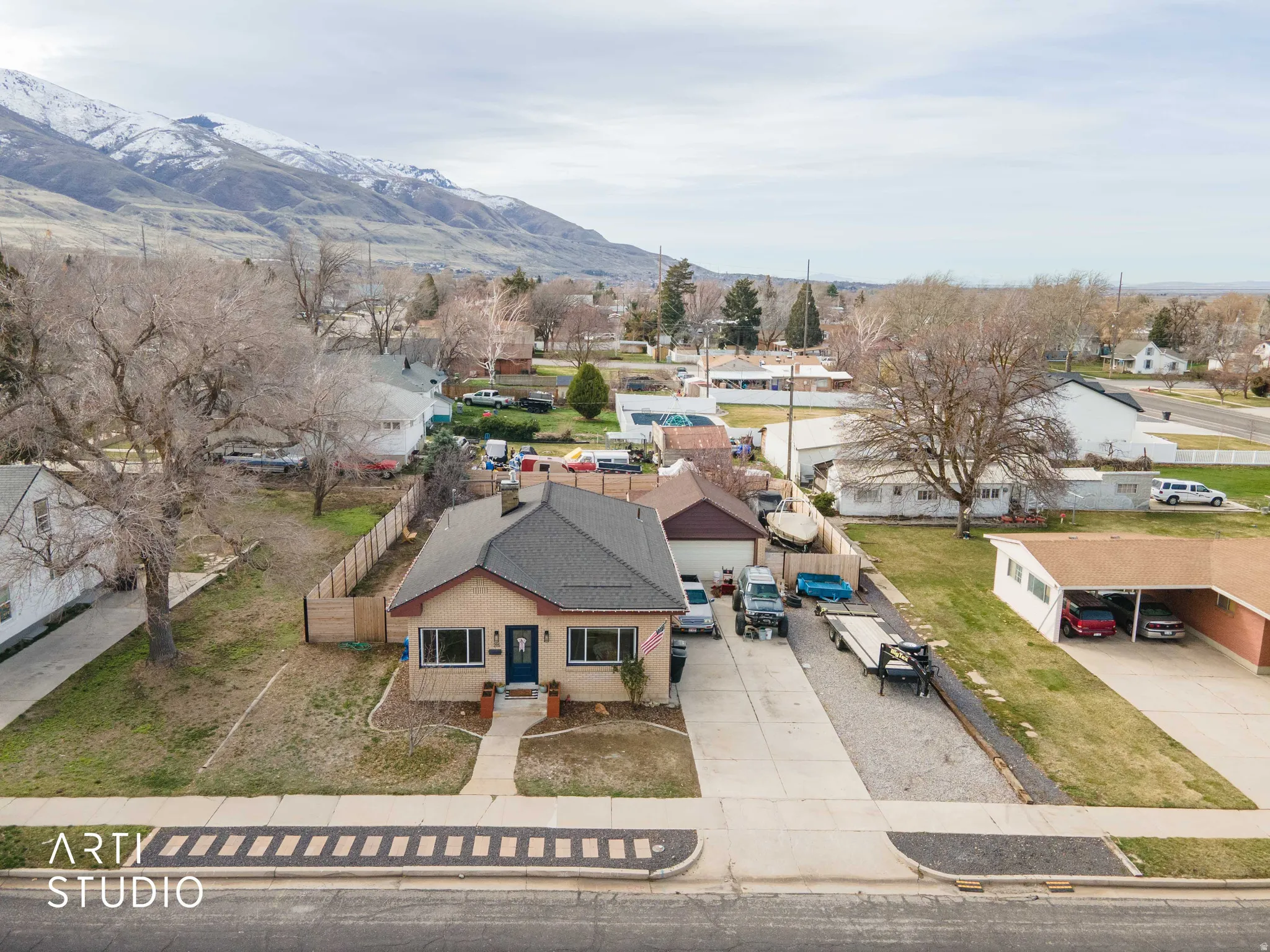 Aerial view of residential area featuring mountains