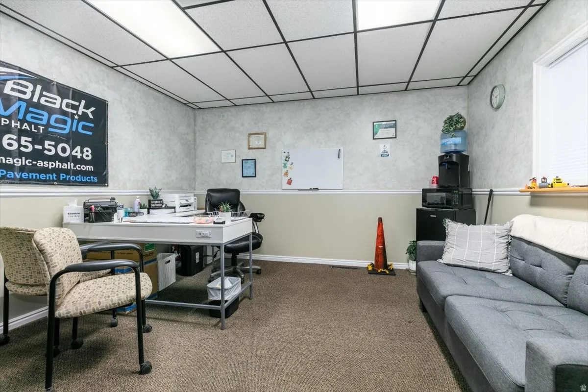 Home office with a drop ceiling
