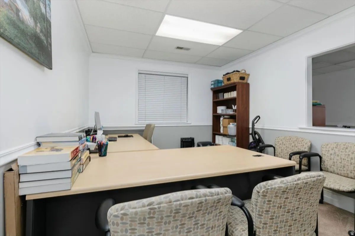 Office space featuring a drop ceiling