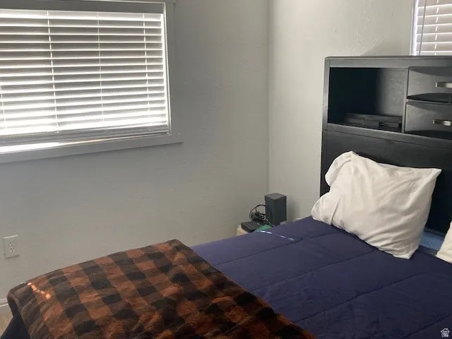 ADU Bedroom featuring a textured wall