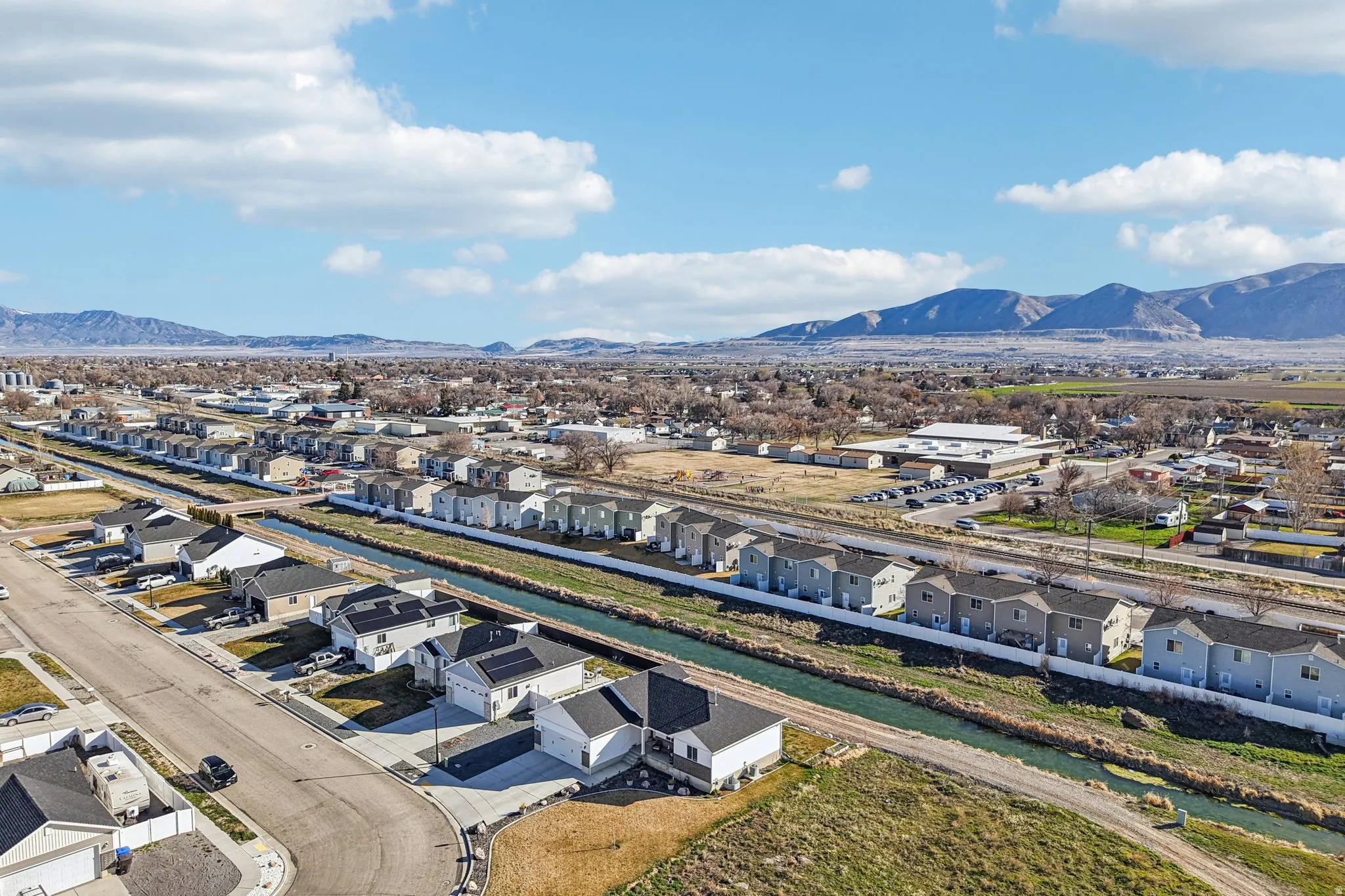 Aerial perspective of suburban area with mountains