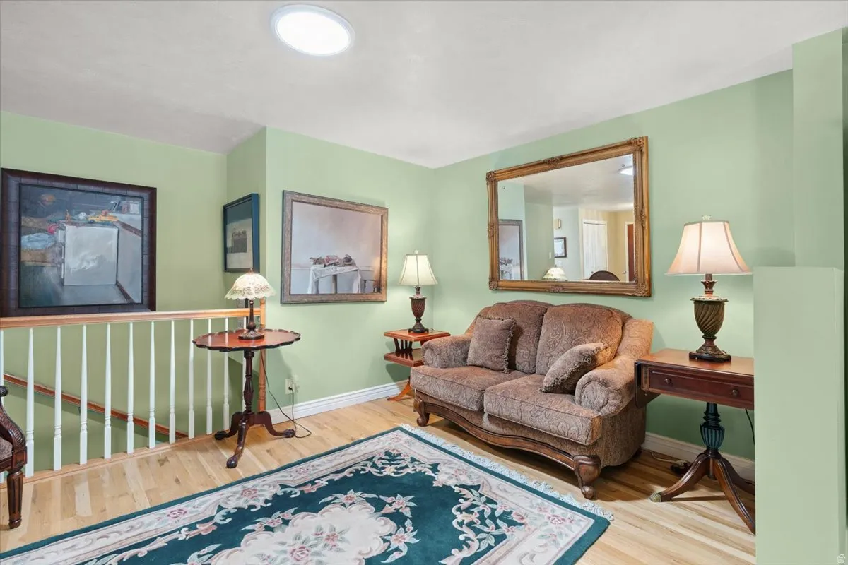 Living area featuring li hard wood flooring