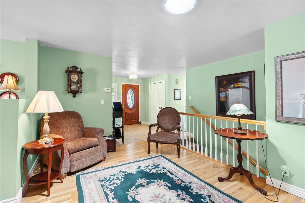 Living area featuring and entry and light hard wood  flooring