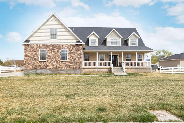 View of front of home with covered porch