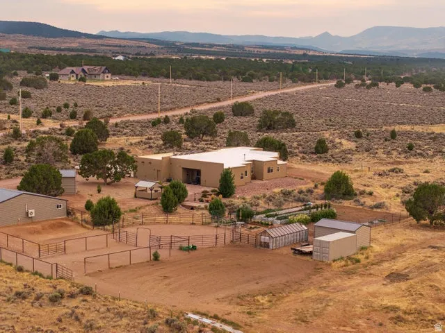 Aerial view at dusk of a mountain view, a view of countryside, and view of desert