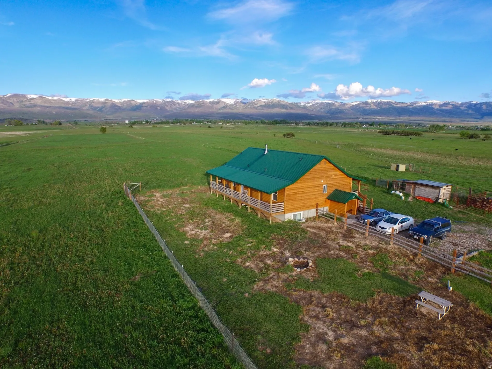 Overview of rural landscape featuring a mountain backdrop