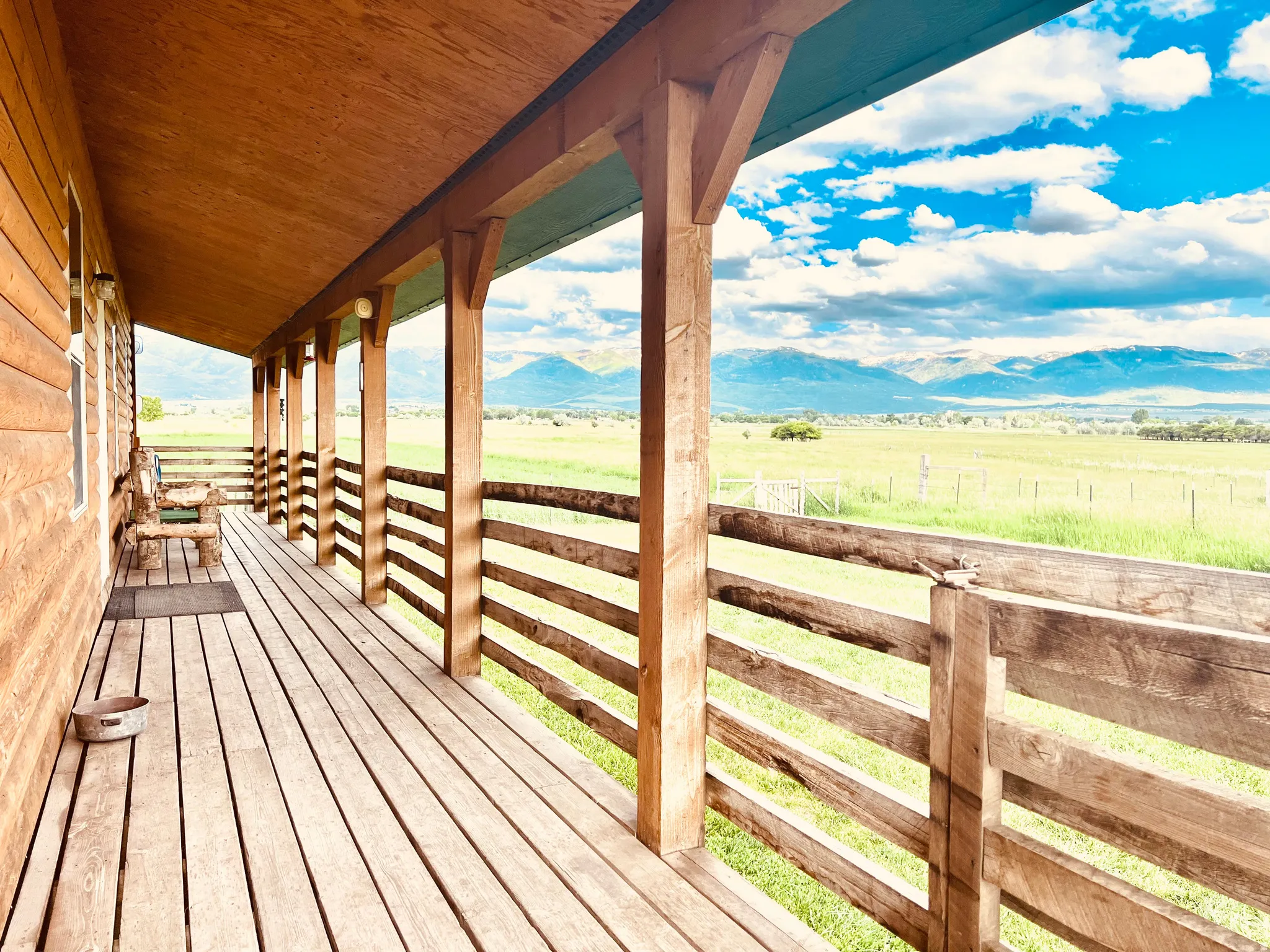 Deck featuring a mountain view and a view of countryside