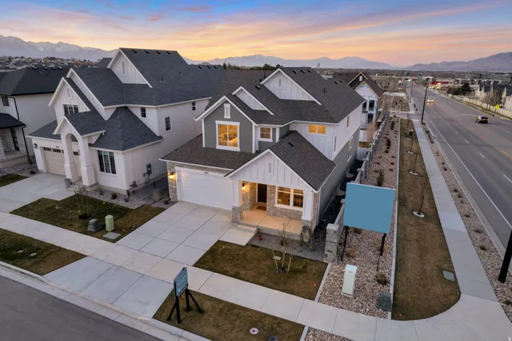 Aerial view at dusk of a residential view and a mountain view