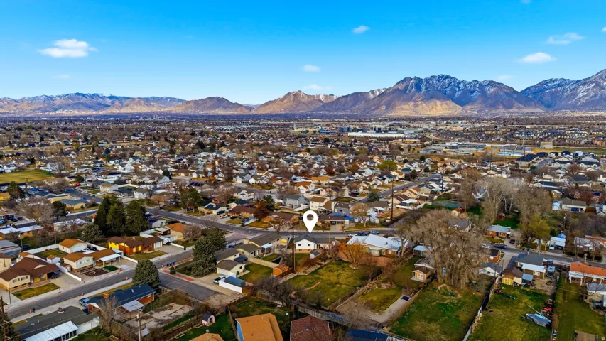 Aerial view of residential area with mountains