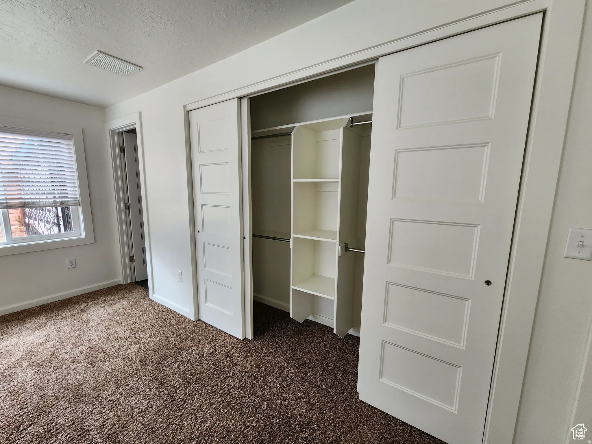 #1 View of custom closet in primary suite