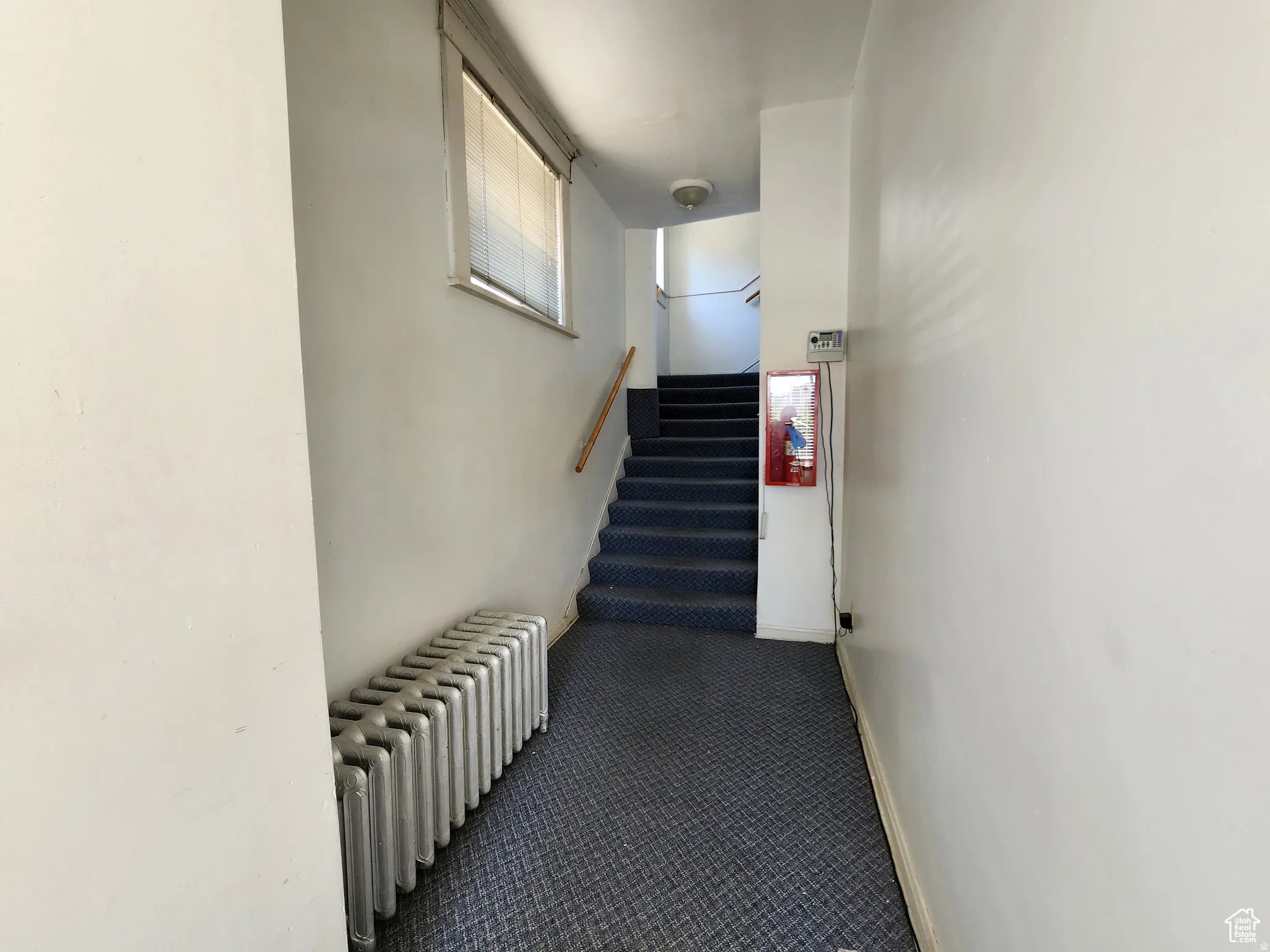Community Hallway and Staircase leading to unit entry doors for #2 through #6