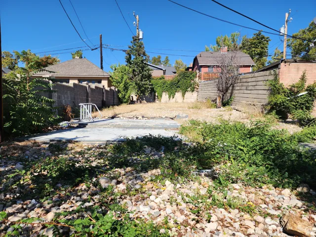 Deepest View of Side Yard (2nd Parcel) with bike rack and patio