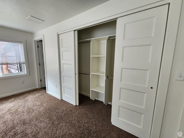 #1 View of custom closet in primary suite