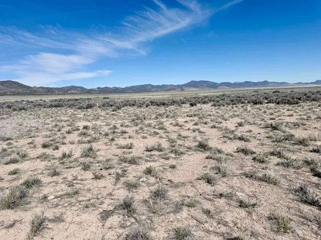View of mountain background featuring a desert landscape and rural landscape