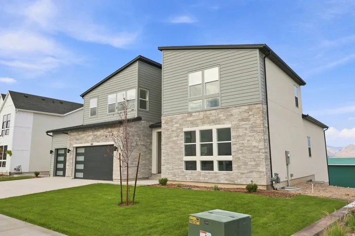 Contemporary exterior with stone facade and horizontal siding