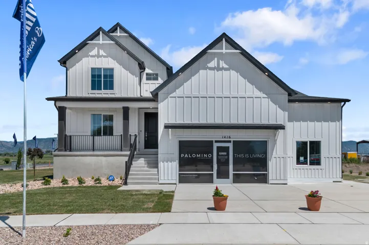 Modern farmhouse exterior with white board-and-batten siding