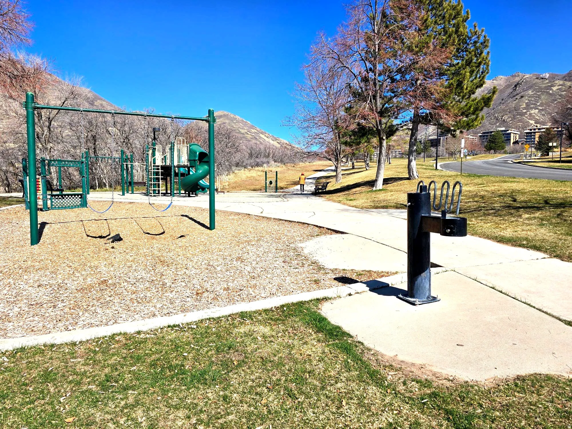 Nearby park with lots of playground equipment and walking trails