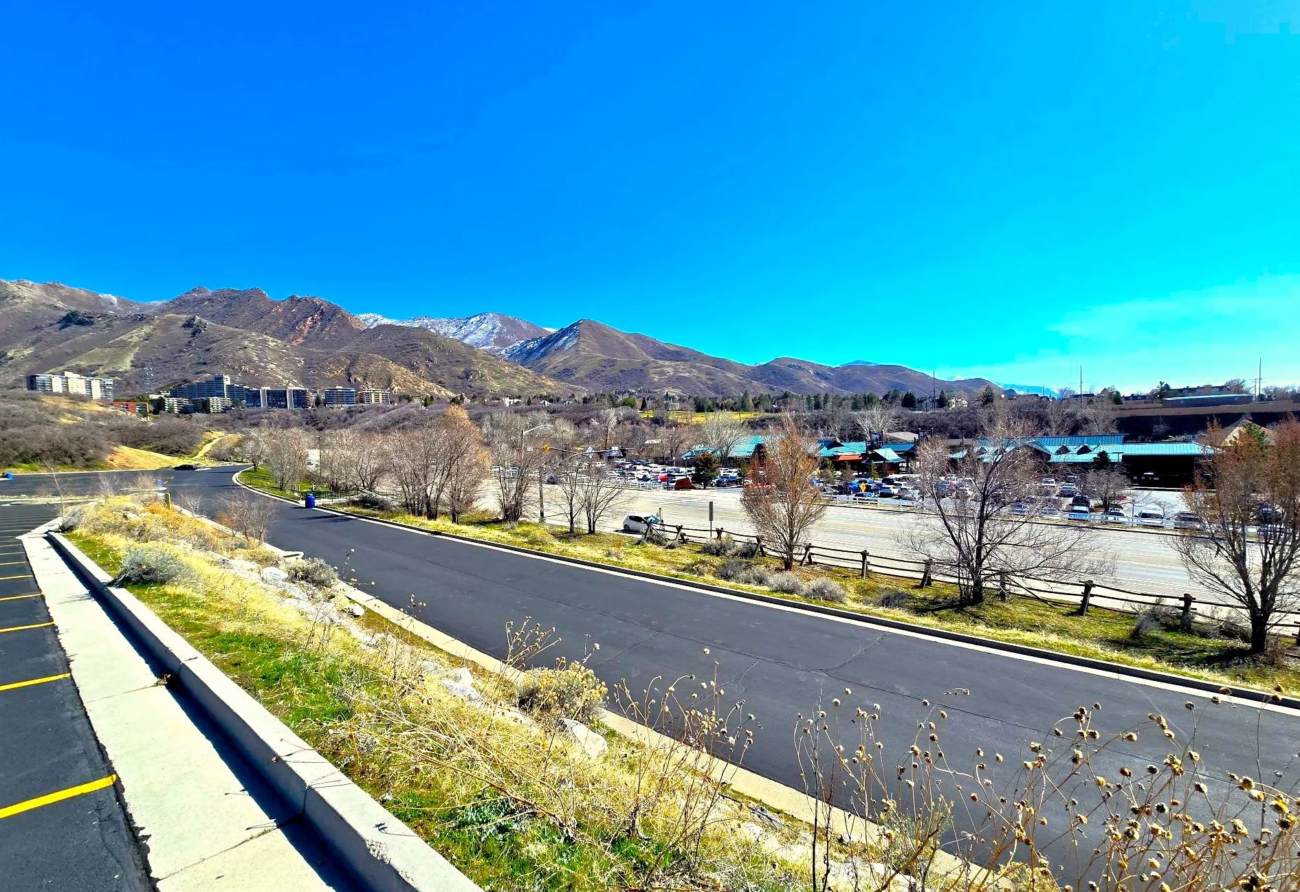 View of Hogle Zoo on the right and the subject red brick building on the left.