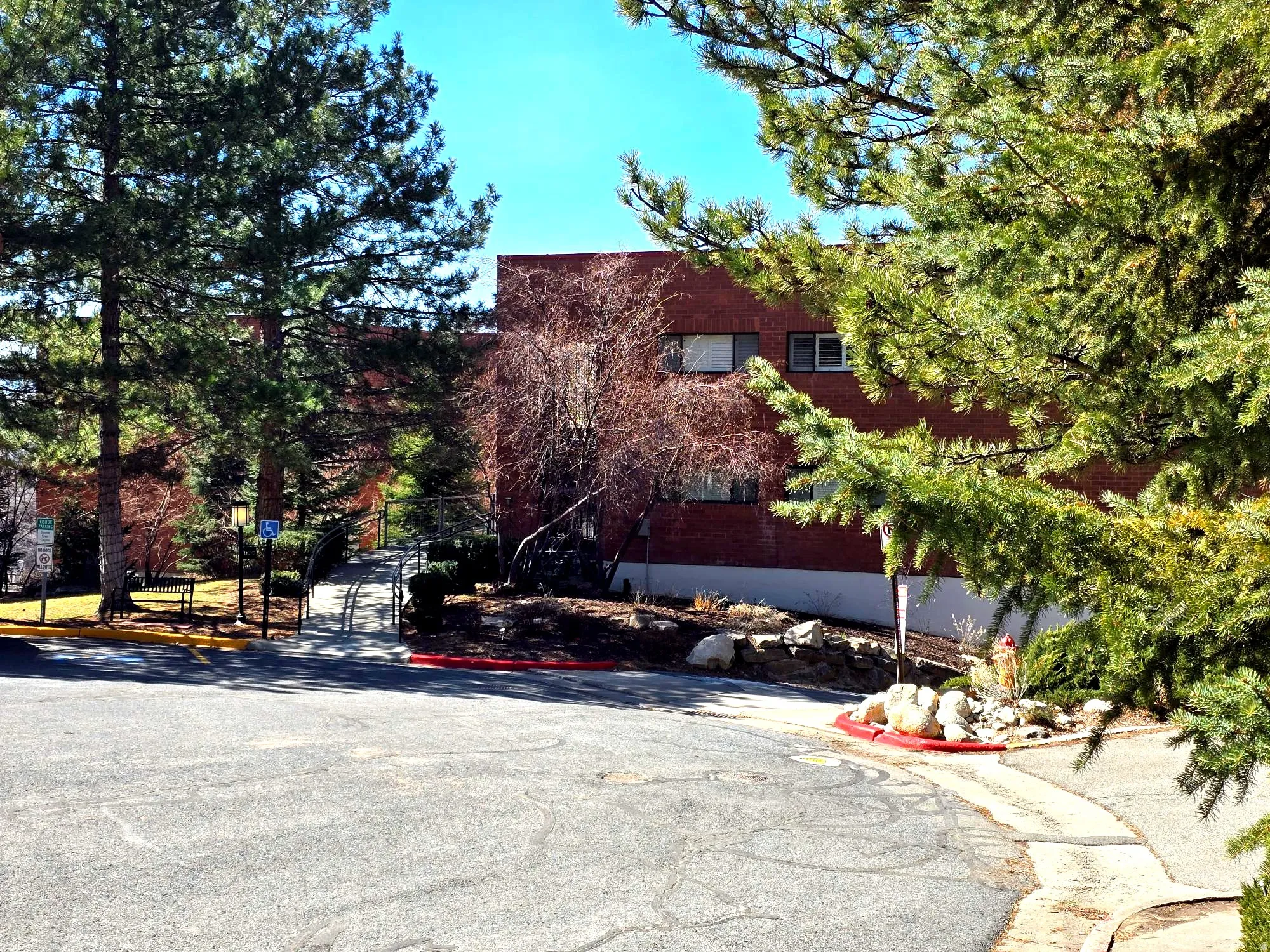 View of front of home featuring brick siding