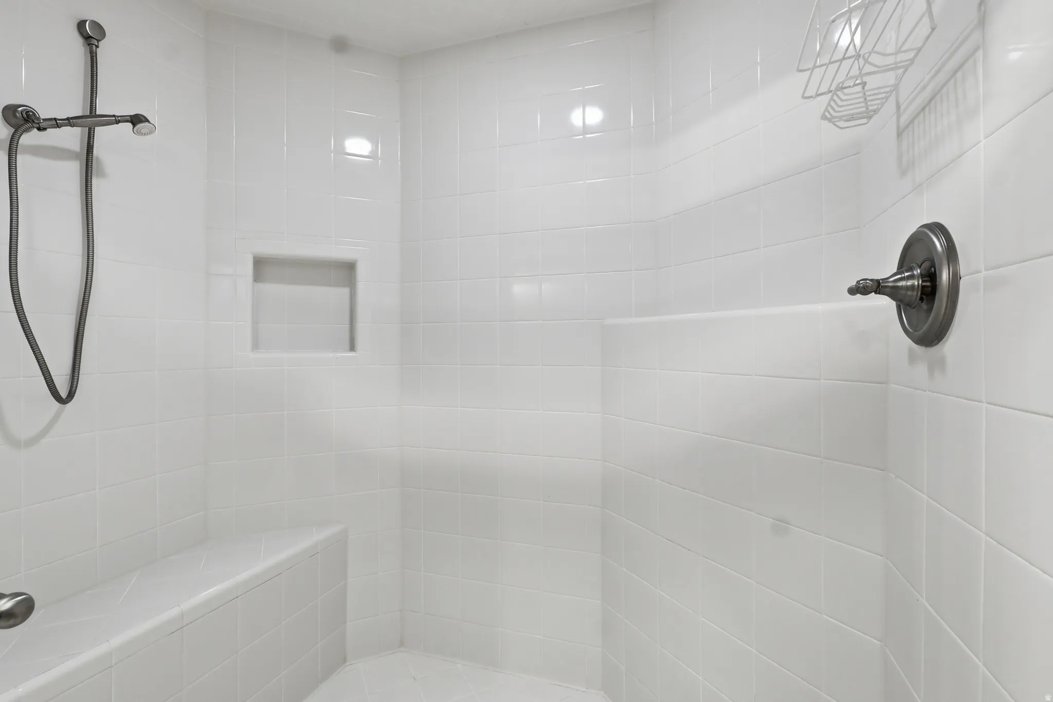 Full bath with tiled shower