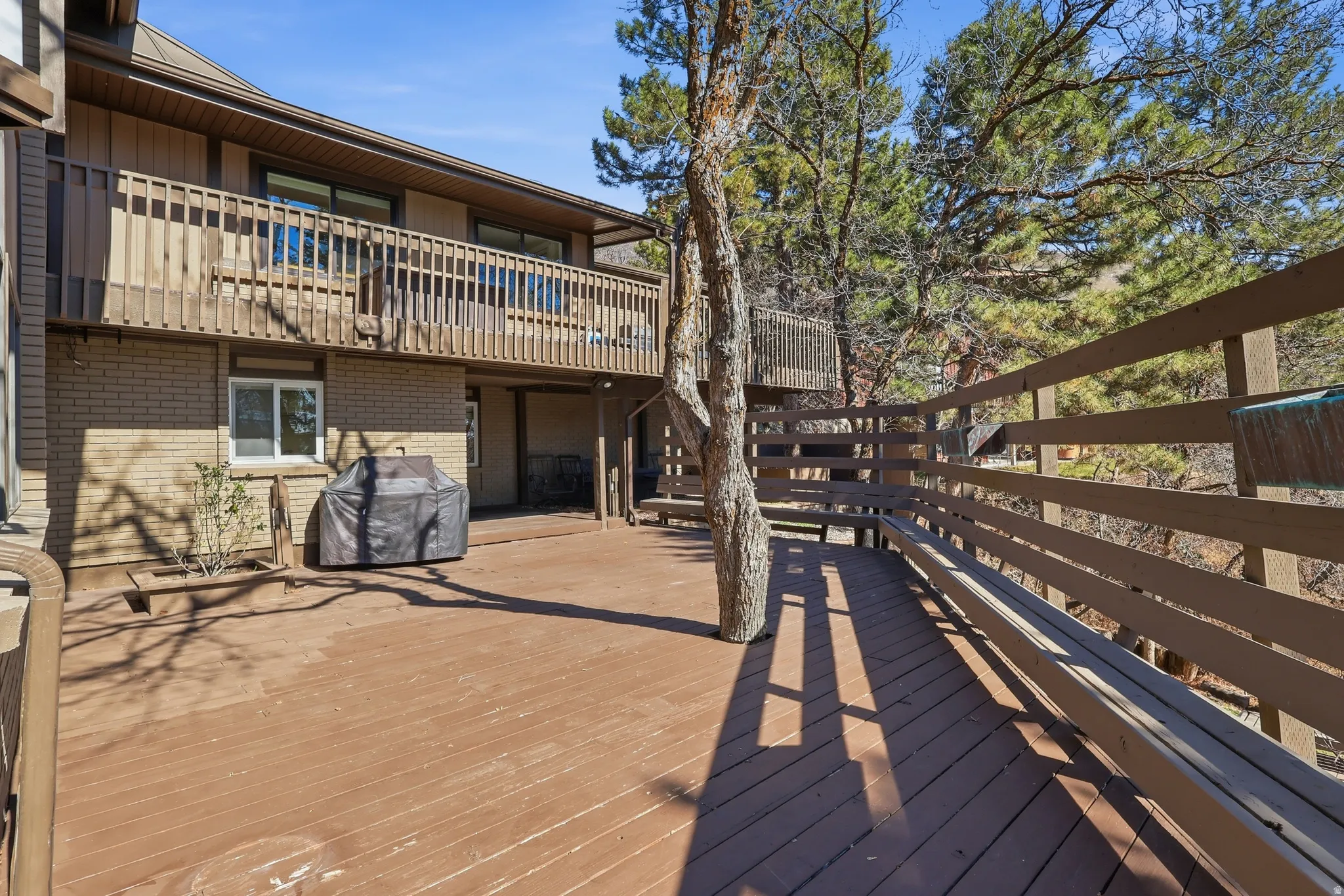 Wooden terrace with area for grilling