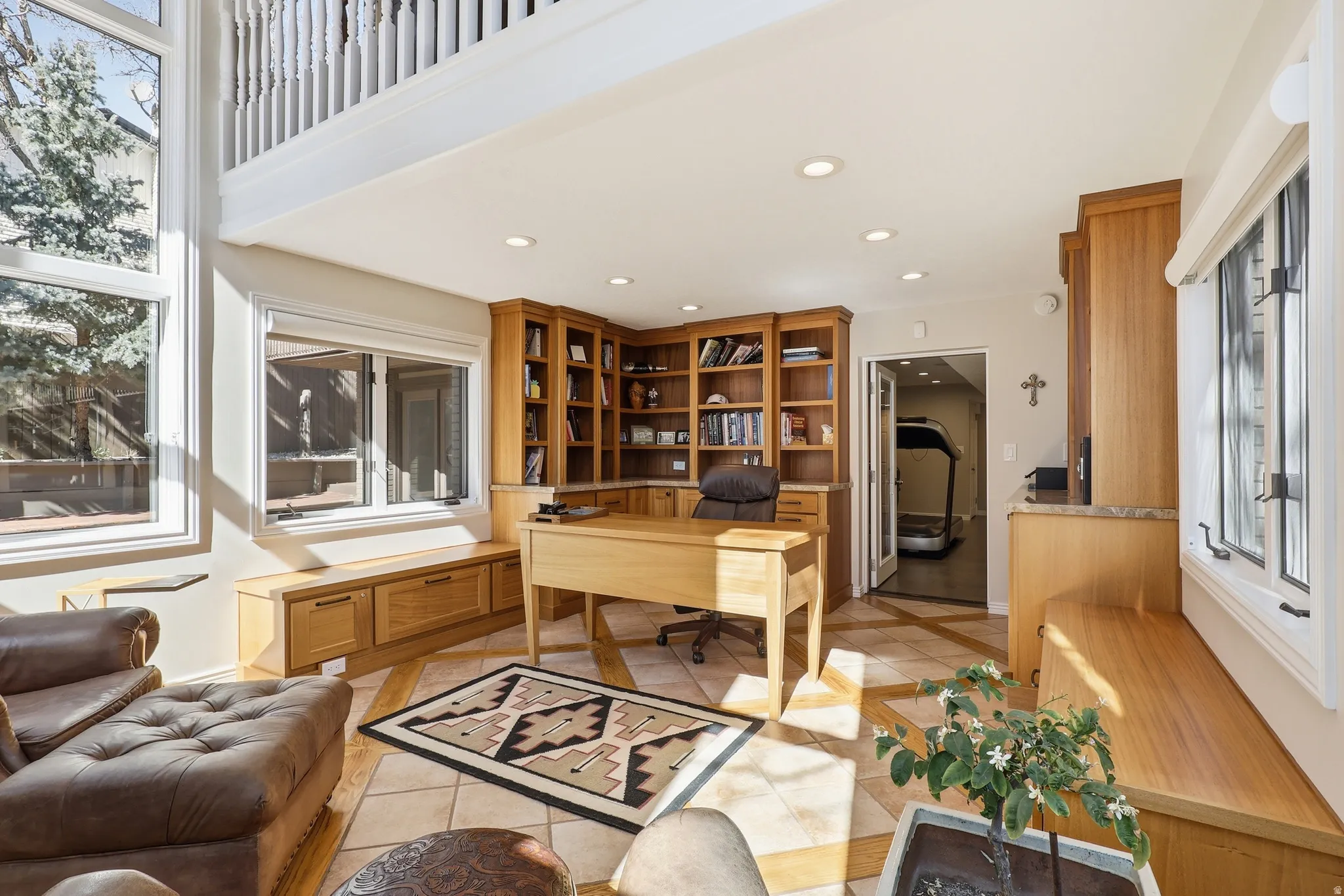 Office area with plenty of natural light, recessed lighting, and light tile patterned floors